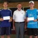 Revesby Workers' Tennis Club Elite Players Jesse and Beau receiving their awards from Director Dennis Hayward.