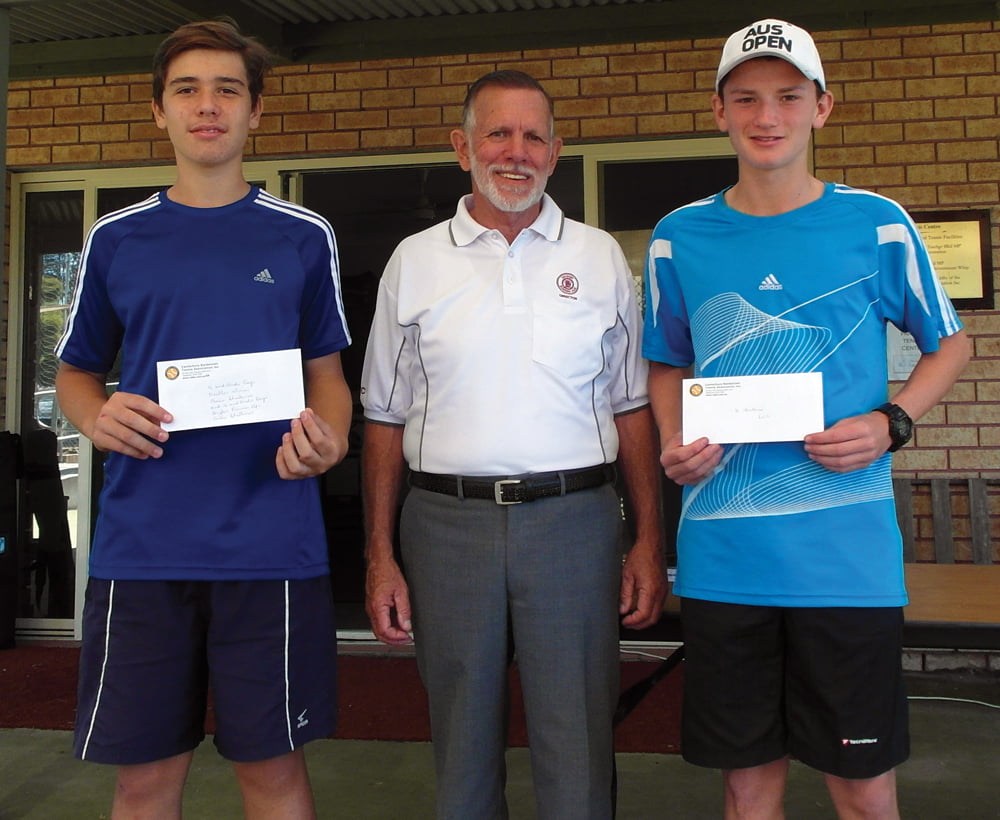 Revesby Workers' Tennis Club Elite Players Jesse and Beau receiving their awards from Director Dennis Hayward.